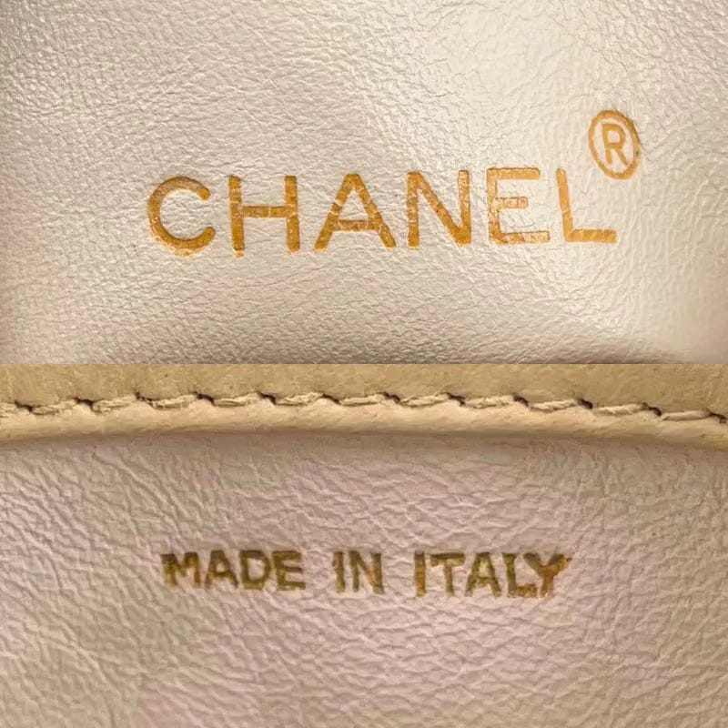 JW445 - CHANEL Vintage Beige Lambskin Cylindrical Bag