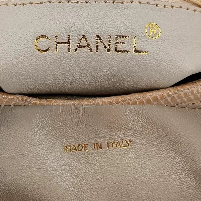 JAH164 - CHANEL Vintage Pink Lizard skin Tassel Camera bag