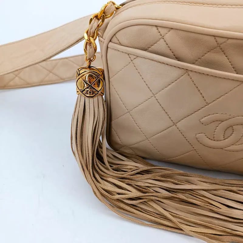 RA862 - CHANEL Vintage Beige Lambskin Tassel Camera Bag