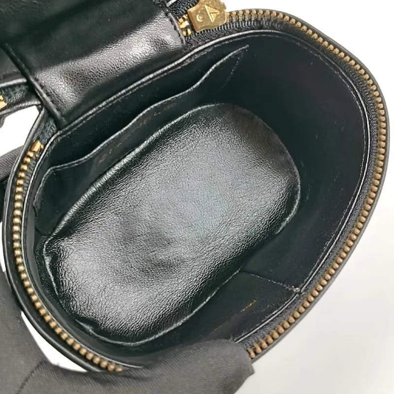 RA253 - CHANEL Vintage Black Lambskin Tassel Bucket Bag
