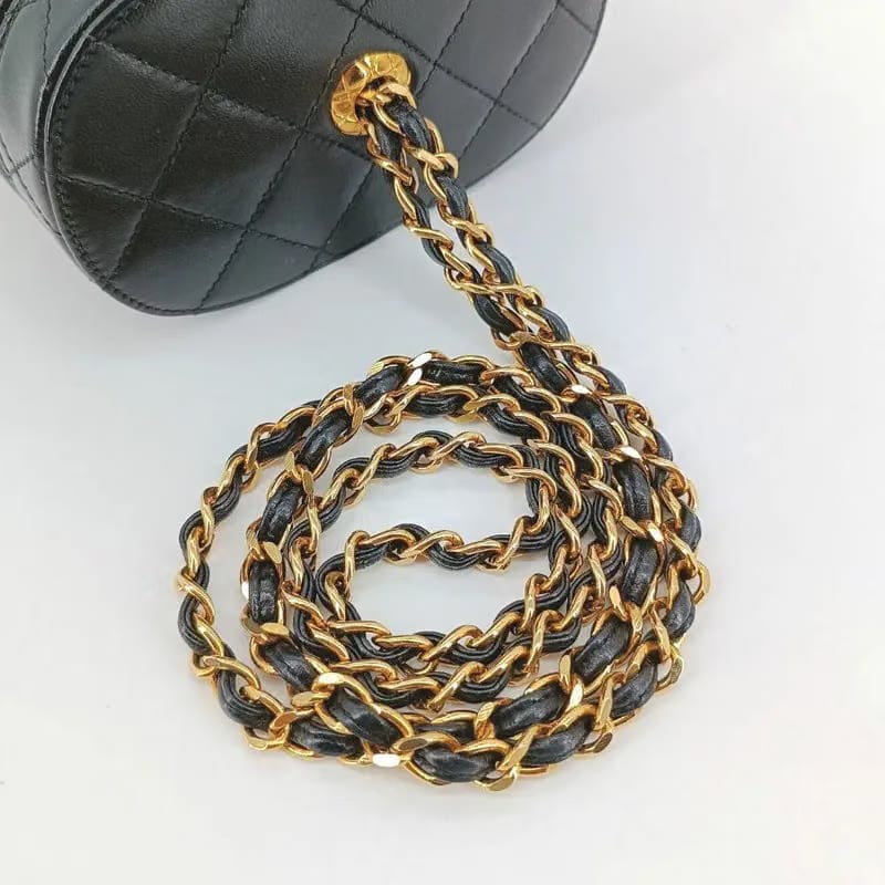 RA253 - CHANEL Vintage Black Lambskin Tassel Bucket Bag