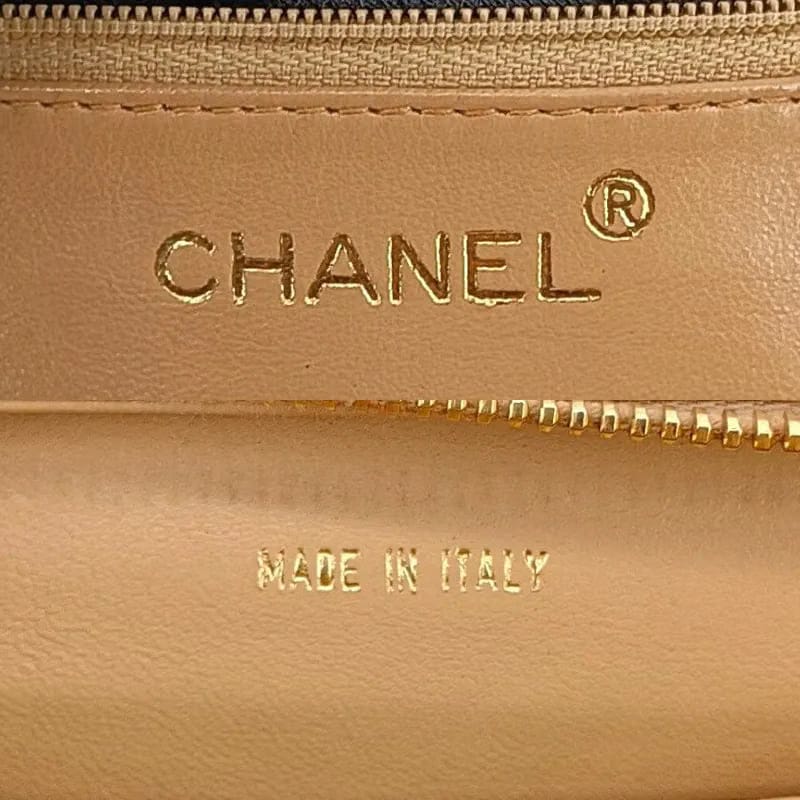 RA491 - CHANEL Vintage Beige Lambskin Quilted Handbag