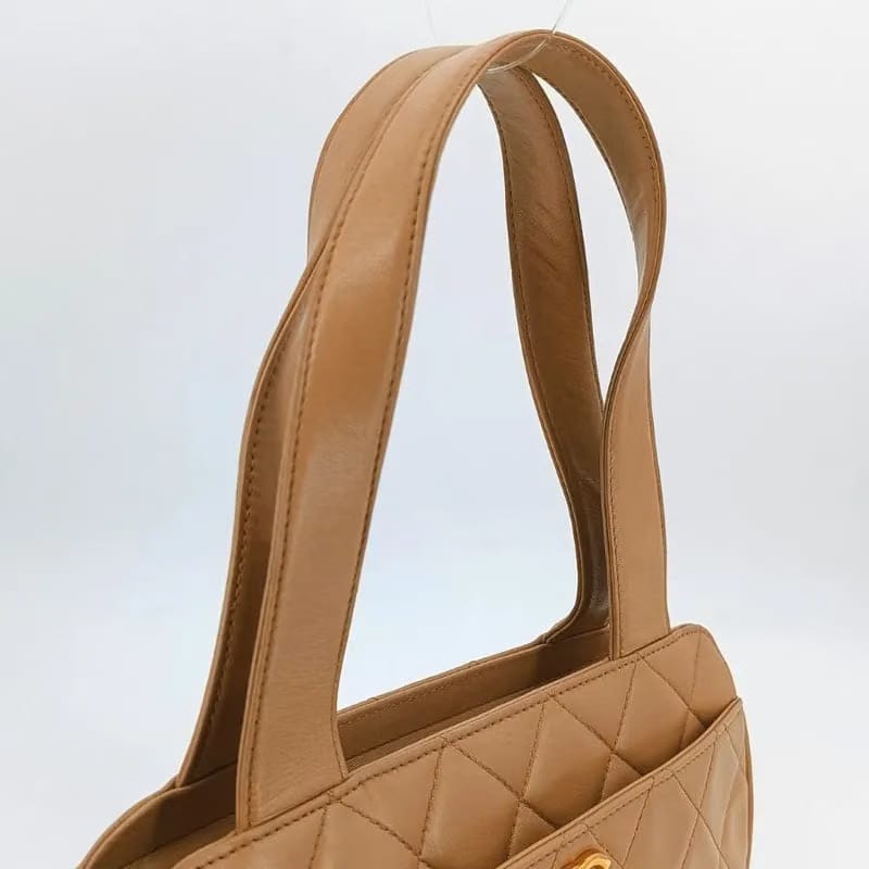 RA491 - CHANEL Vintage Beige Lambskin Quilted Handbag