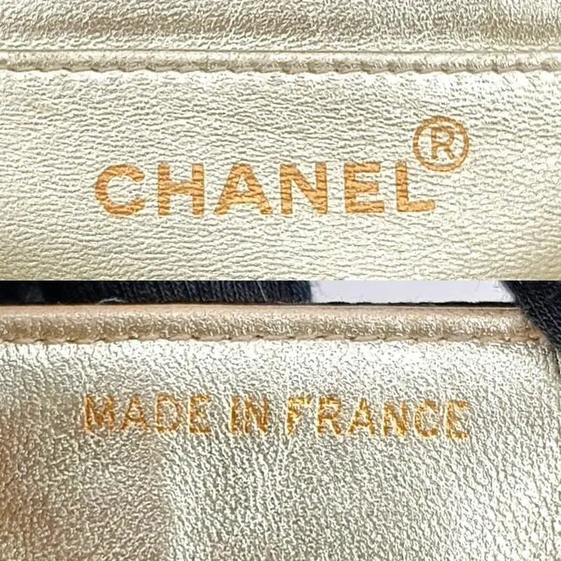 JT719 - CHANEL Vintage Black Satin Chevron Gold Chain Flap Bag