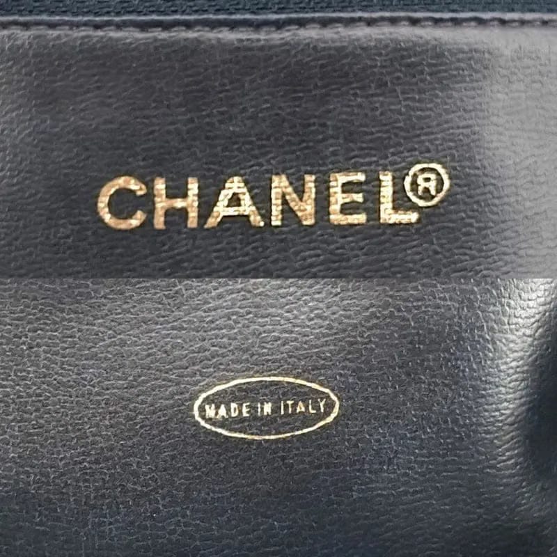 RA382 - CHANEL Vintage Navy Caviar Leather Triple CC Tote Bag