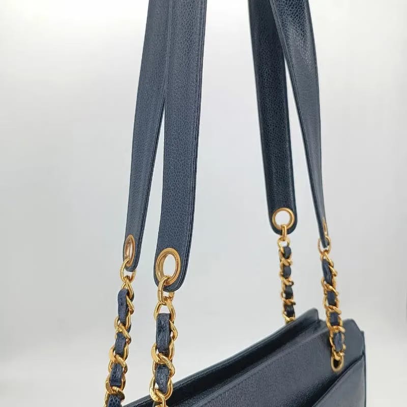 RA382 - CHANEL Vintage Navy Caviar Leather Triple CC Tote Bag