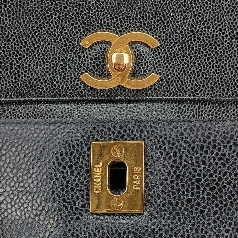 RA522 - CHANEL Vintage Black Caviar Leather Gold Ball Bucket Bag
