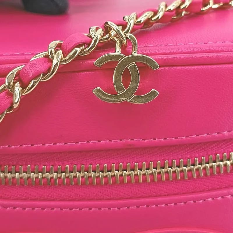 RA385 - CHANEL Pink Lambskin Vanity Case Bag