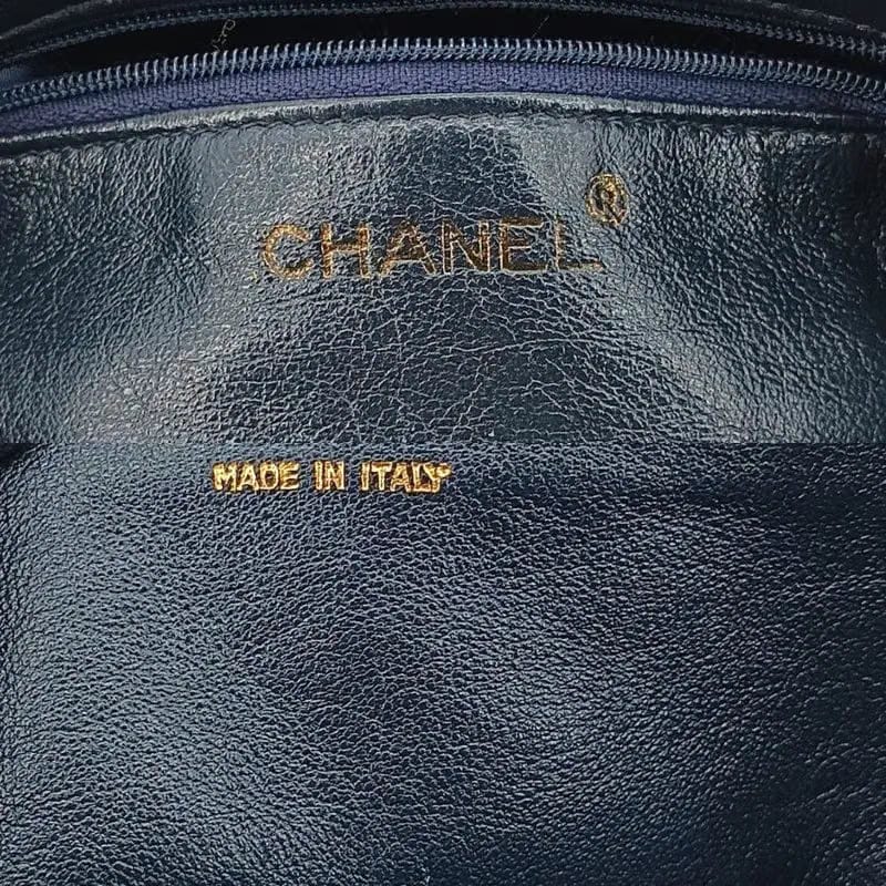 JT581 - CHANEL Vintage Navy Lambskin Tassel Vanity Case Bag