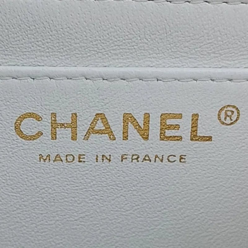 RA166 - CHANEL Vintage White Lambskin 25cm Flap Bag