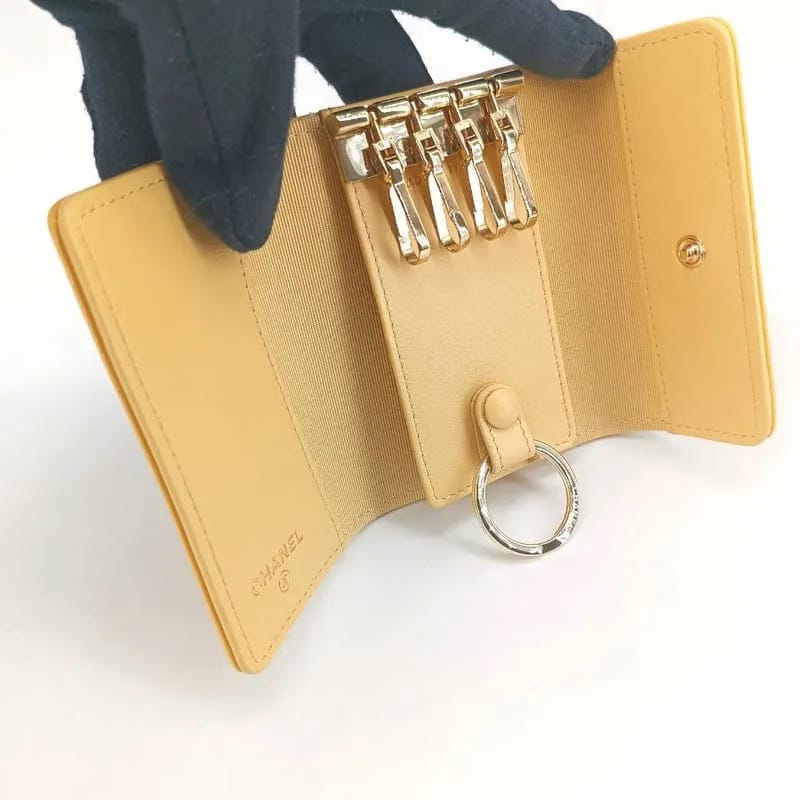 JT400 - CHANEL Yellow Caviar Leather Camellia Flap 4 Key Holder
