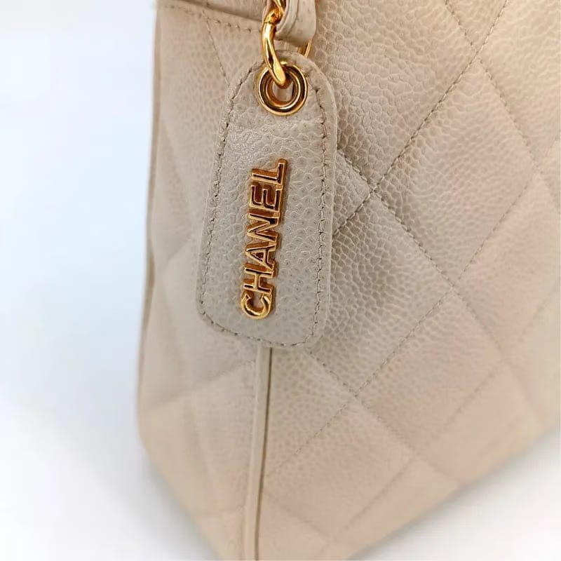 JS705 - CHANEL Vintage Beige Caviar Leather Quilted Camera Bag