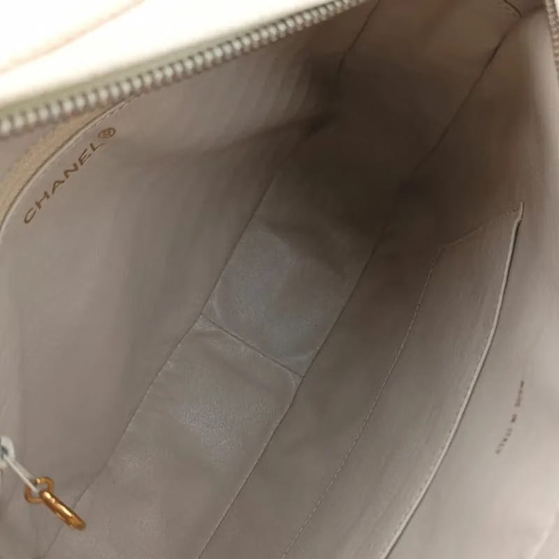 JS705 - CHANEL Vintage Beige Caviar Leather Quilted Camera Bag