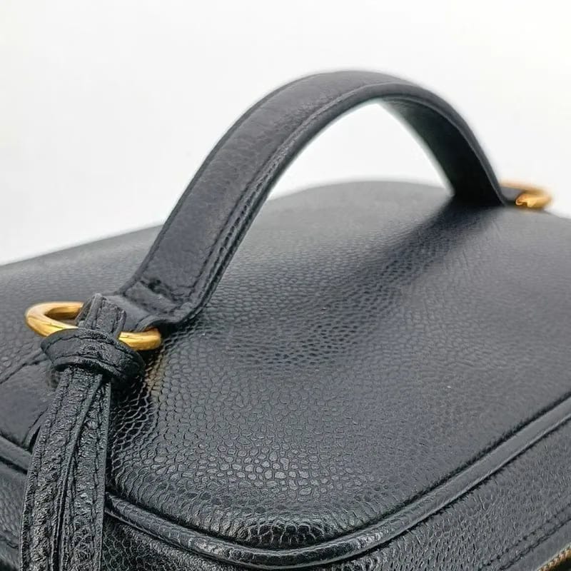 JS502 - CHANEL Vintage Black Caviar Embossed Logo Cosmetic Bag