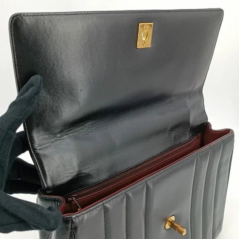 RA658 - CHANEL Vintage Black Lambskin Vertical Flap Handbag