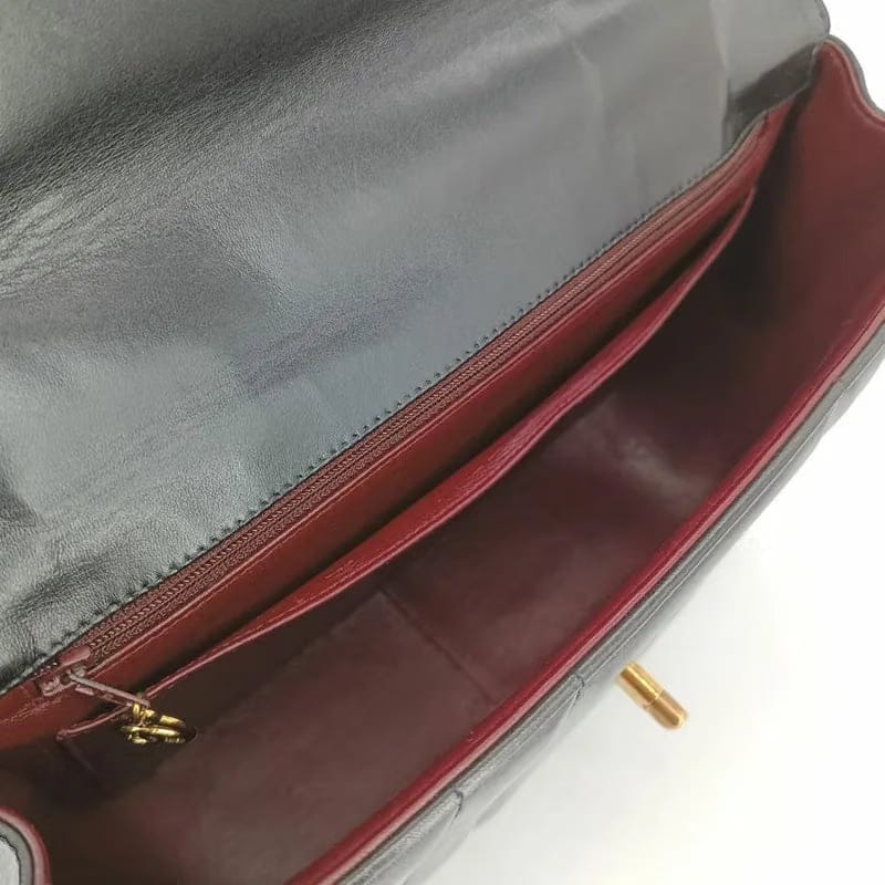 RA658 - CHANEL Vintage Black Lambskin Vertical Flap Handbag