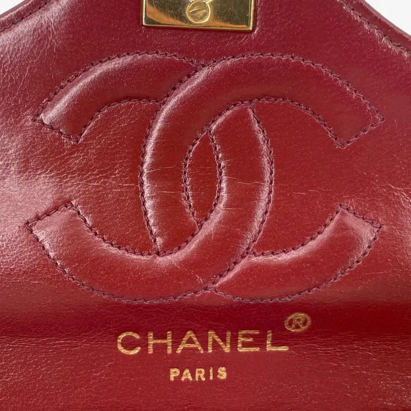 RA652 - CHANEL Vintage Black Lambskin Quilted Flap Bag