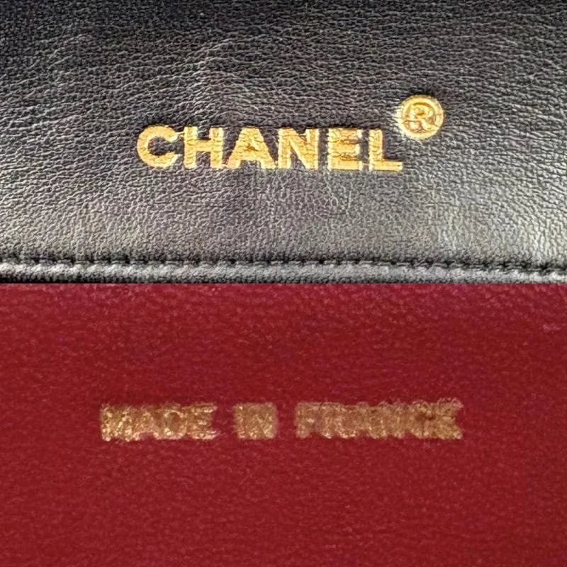 JW396 - CHANEL Vintage Black Lambskin Camellia Flap Bag