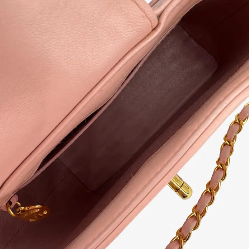 C648 - CHANEL Vintage Pink Lambskin Handbag