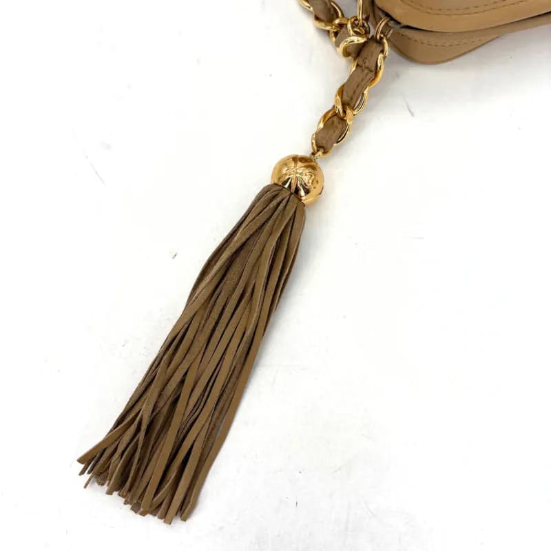 RE650 - CHANEL Vintage Beige Lambskin Tassel Camera Bag