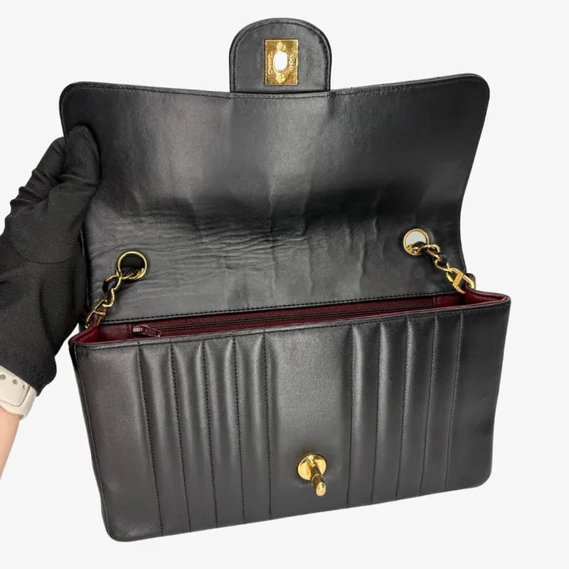 RG014 - CHANEL Vintage Black Lambskin Vertical Flap Bag