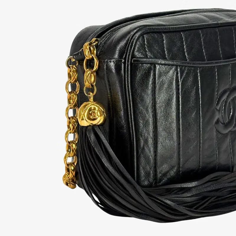 JZ554 - CHANEL Vintage Black Lambskin Tassels Gold Chain Camera Bag