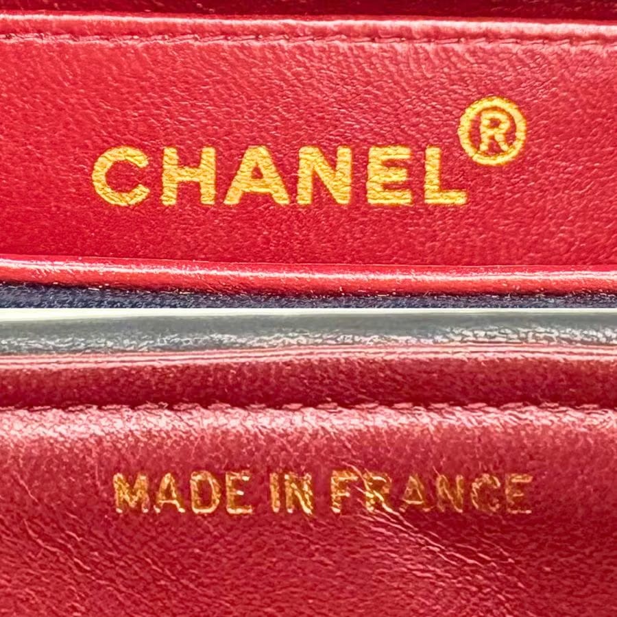 KA748 - CHANEL Vintage Navy Lambskin Horizontal Stripes Flap Bag