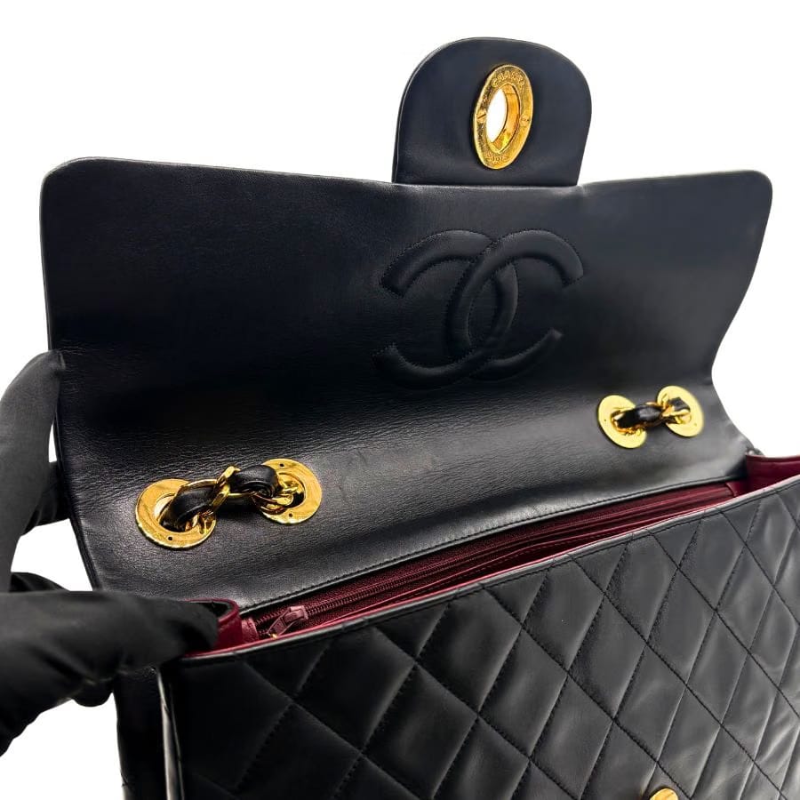 JAH231 - CHANEL Vintage Black Lambskin Maxi Classic Flap Bag