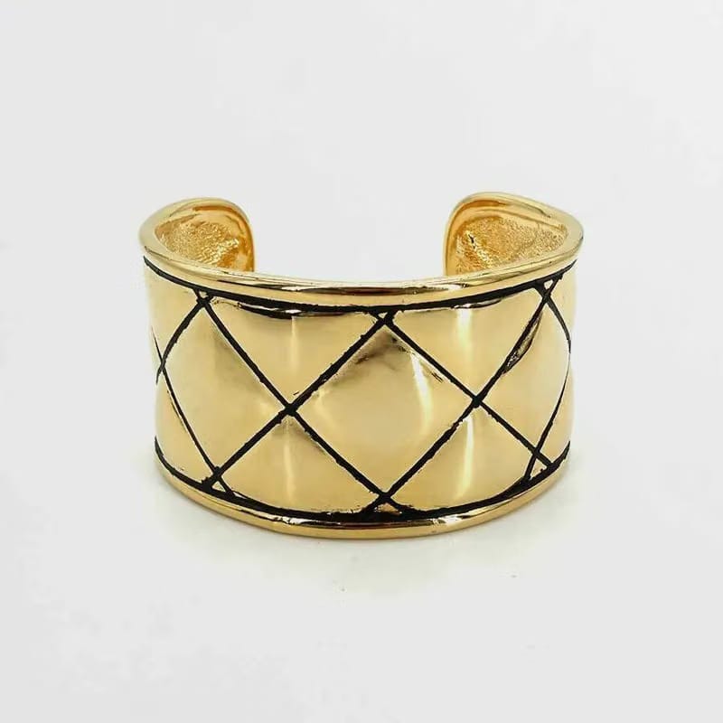 JR889 - CHANEL Gold Quilted Cuff Bracelet