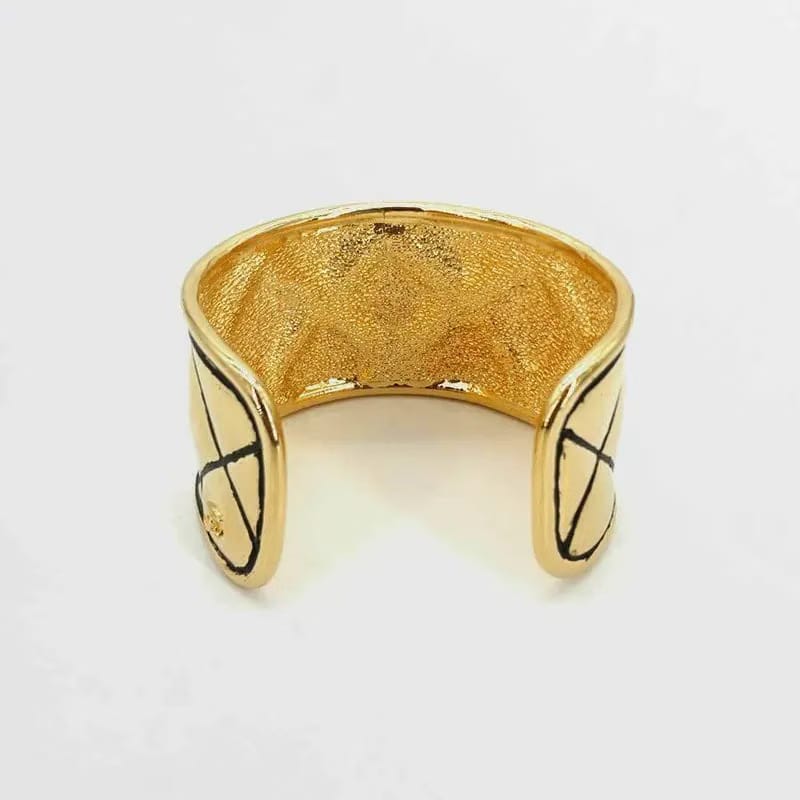 JR889 - CHANEL Gold Quilted Cuff Bracelet