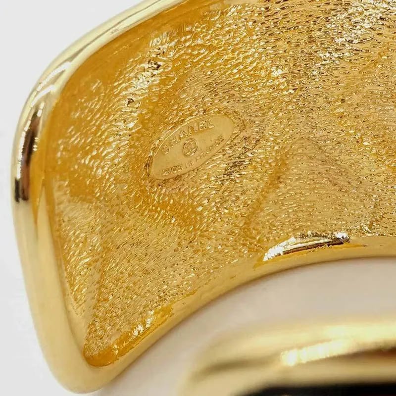 JR889 - CHANEL Gold Quilted Cuff Bracelet