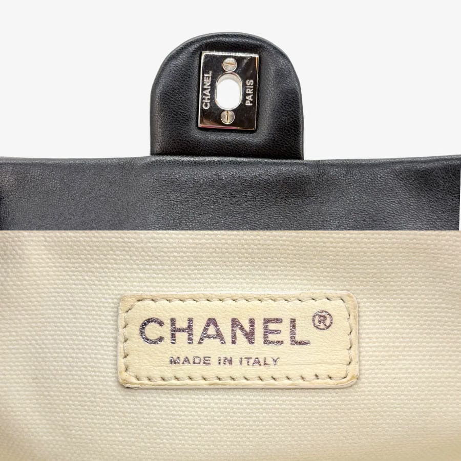 RG367 - CHANEL Black Lmabskin Perforated Flap Bag