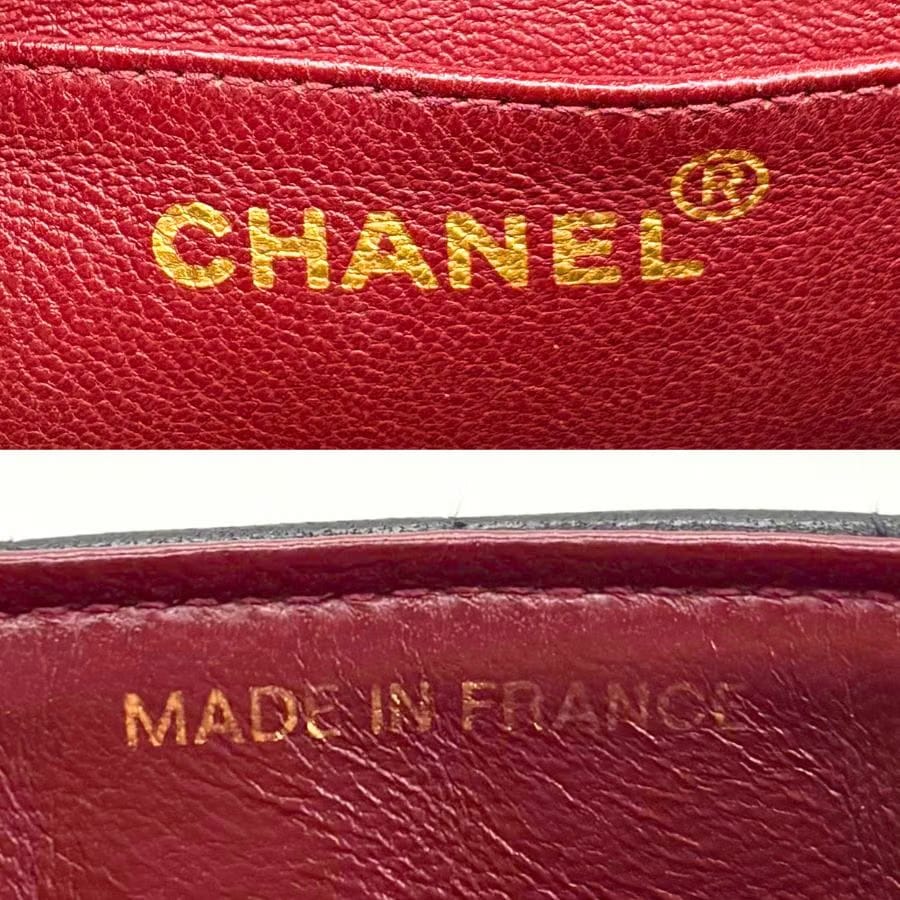 KA735 - CHANEL Vintage Black Lambskin Vertical Gold Chain Flap Bag