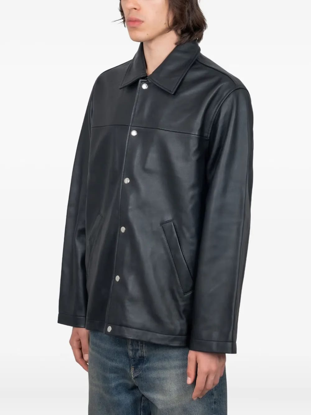 snap-fastening leather jacket