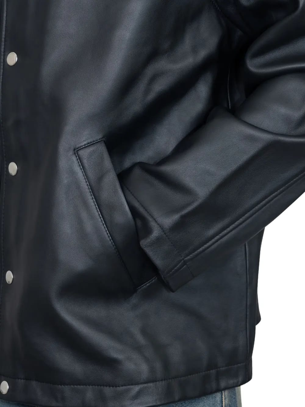 snap-fastening leather jacket