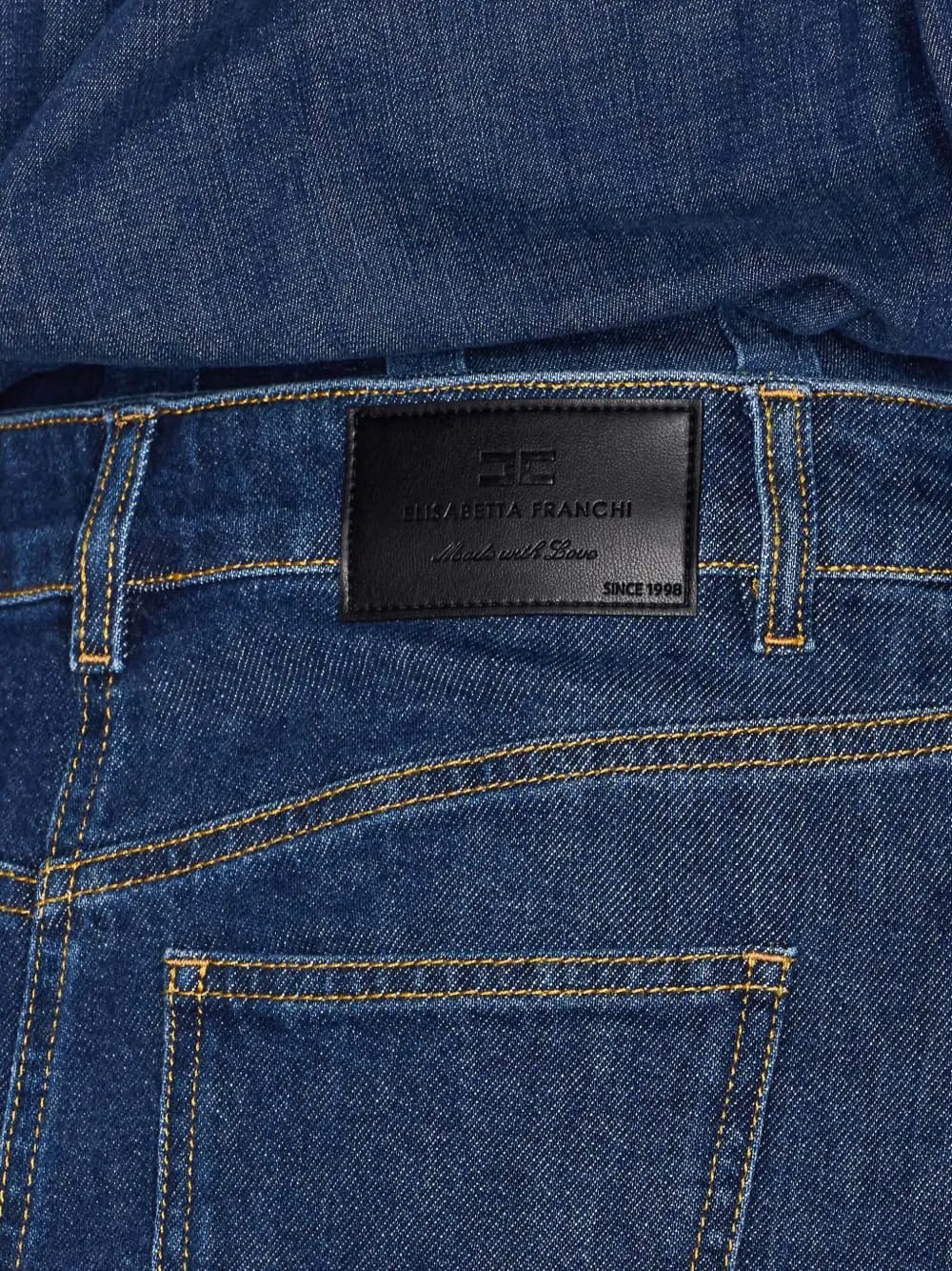 snap-button denim mini dress