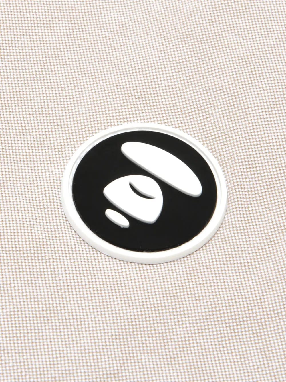 Moonface-embroidered cotton shirt