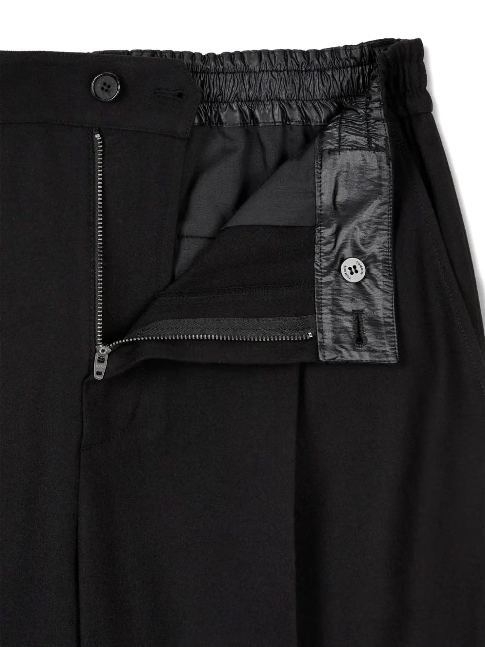 button-fastening pleated trousers