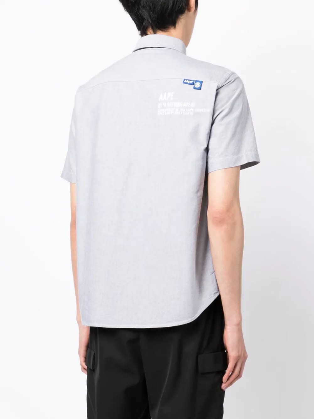camouflage-print logo-patch shirt