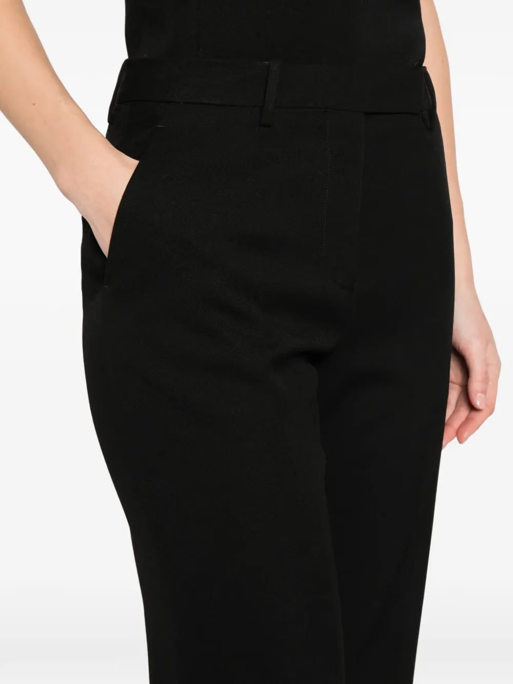 buttoned pocket trousers