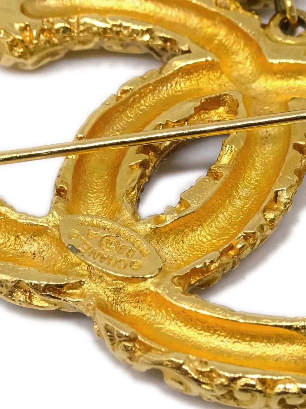 1993 metal tassel CC brooch