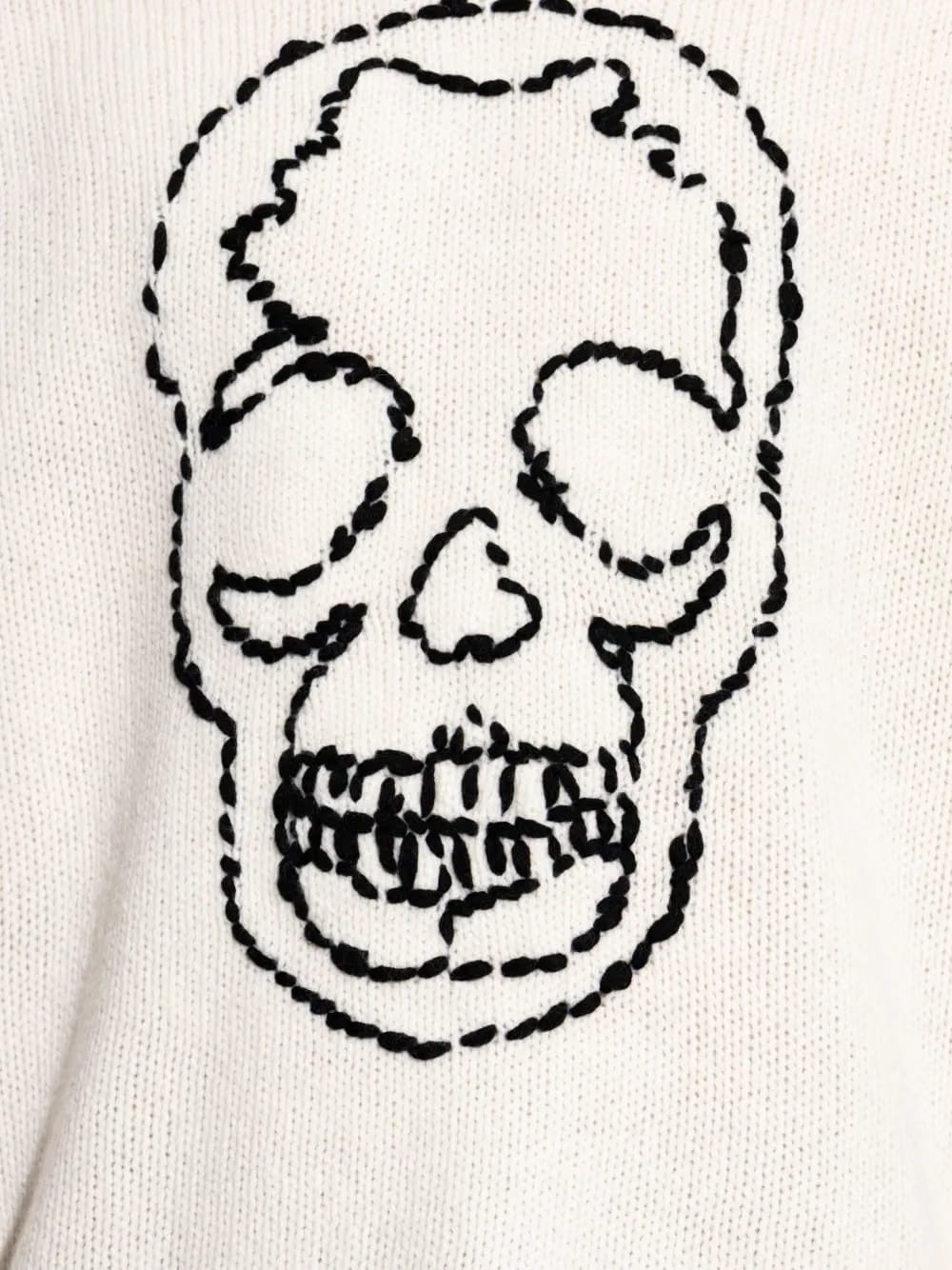 skull-embroidered distressed sweater