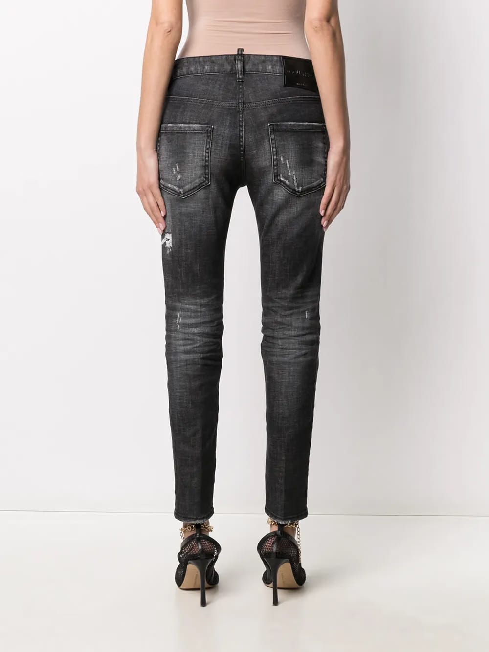 distressed-effect logo-patch denim jeans