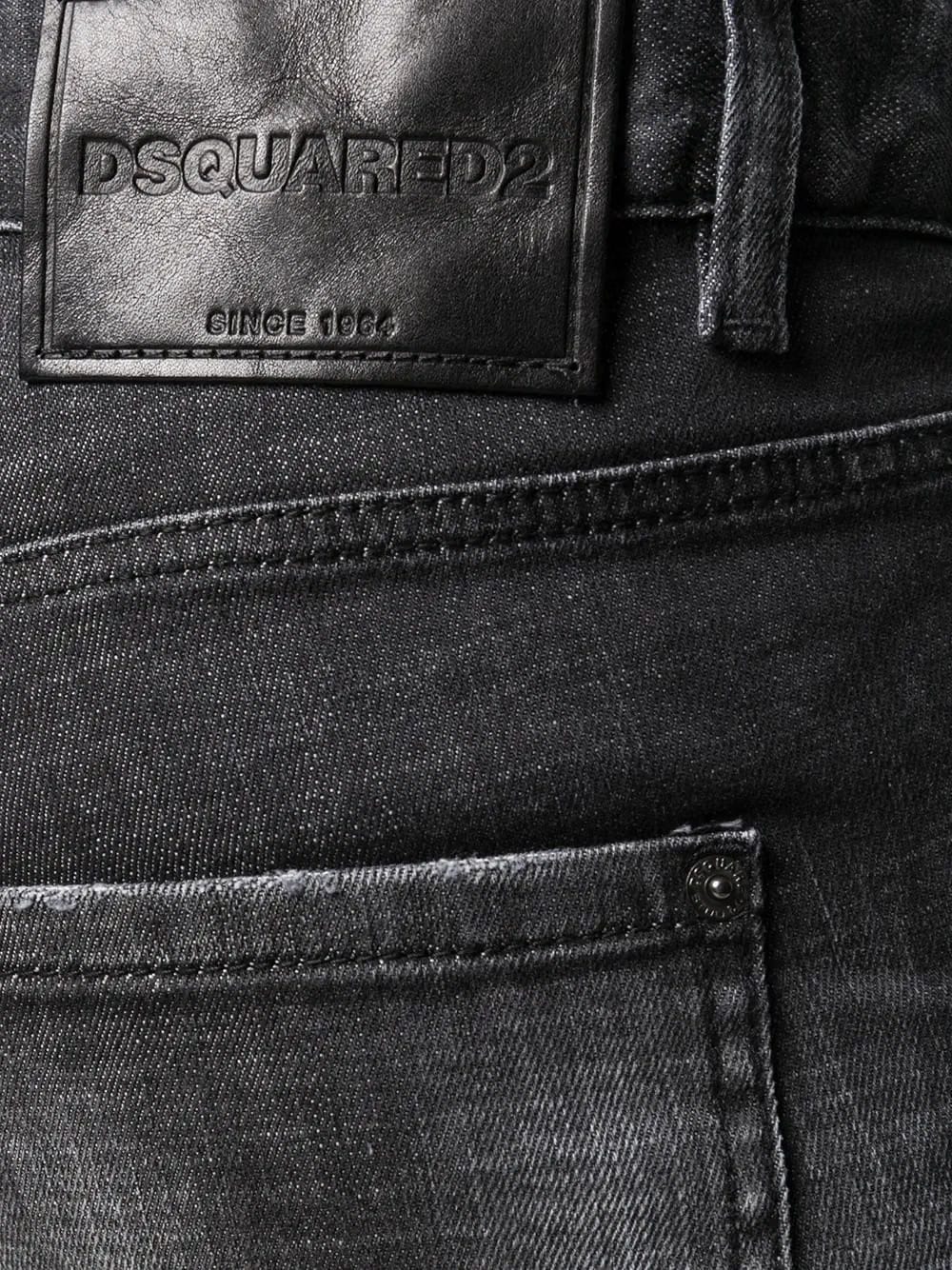 distressed-effect logo-patch denim jeans