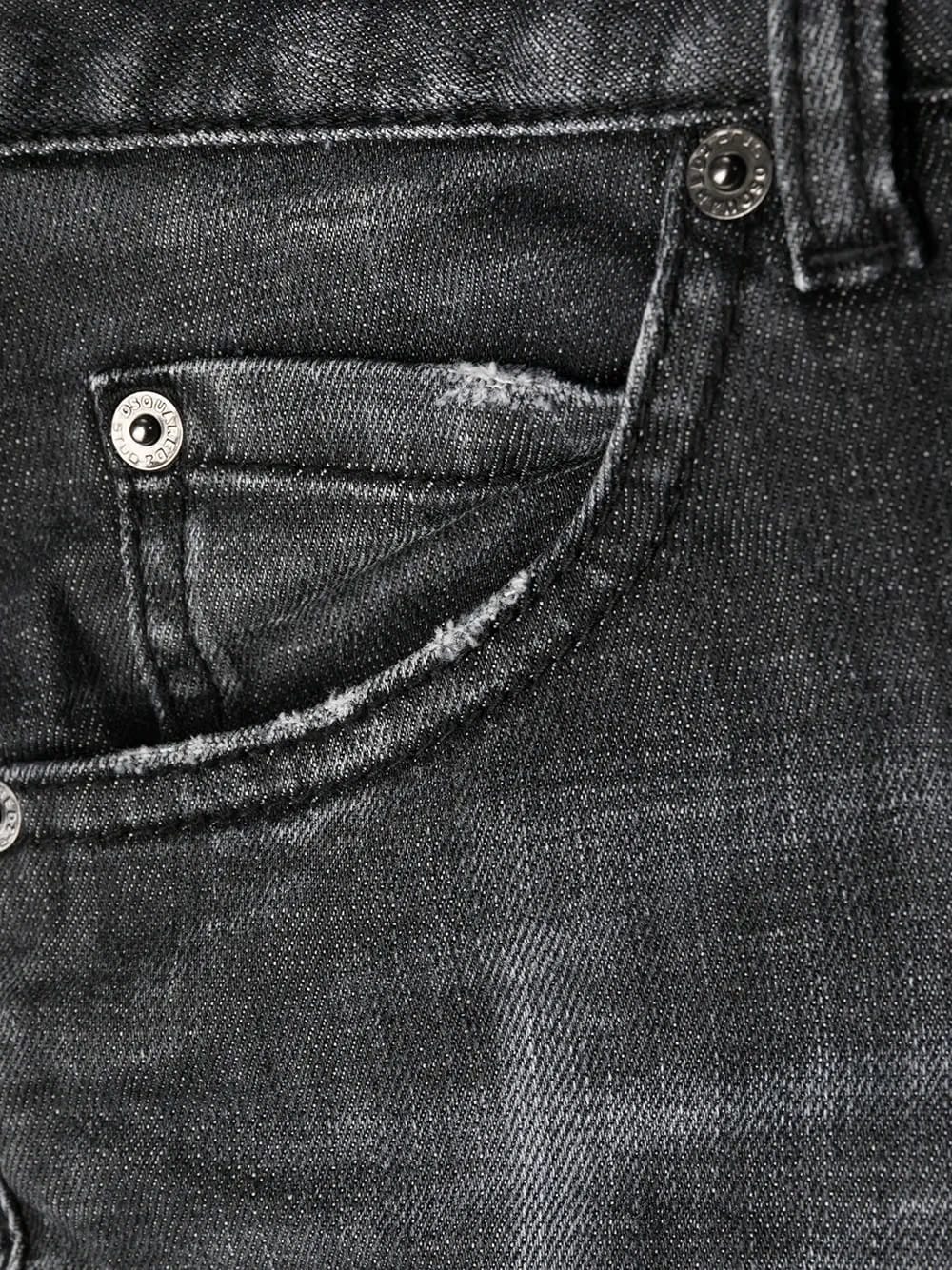 distressed-effect logo-patch denim jeans