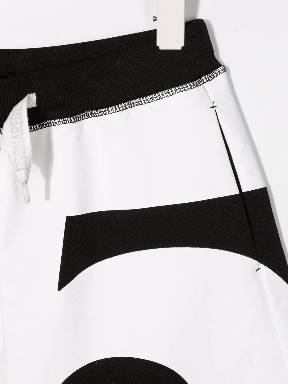 number-print track shorts