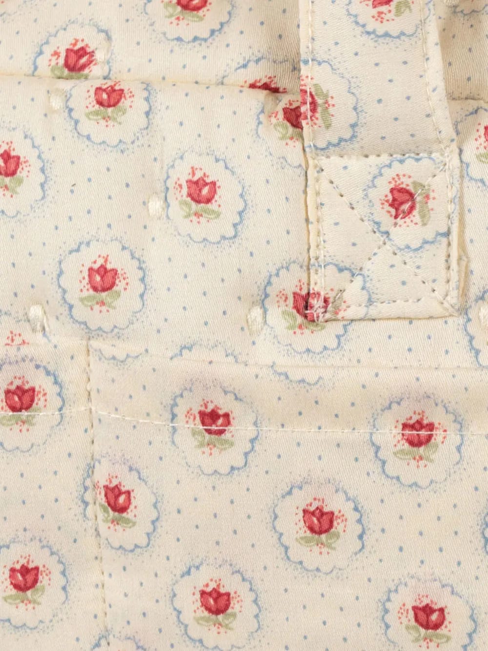 floral-print doll bag