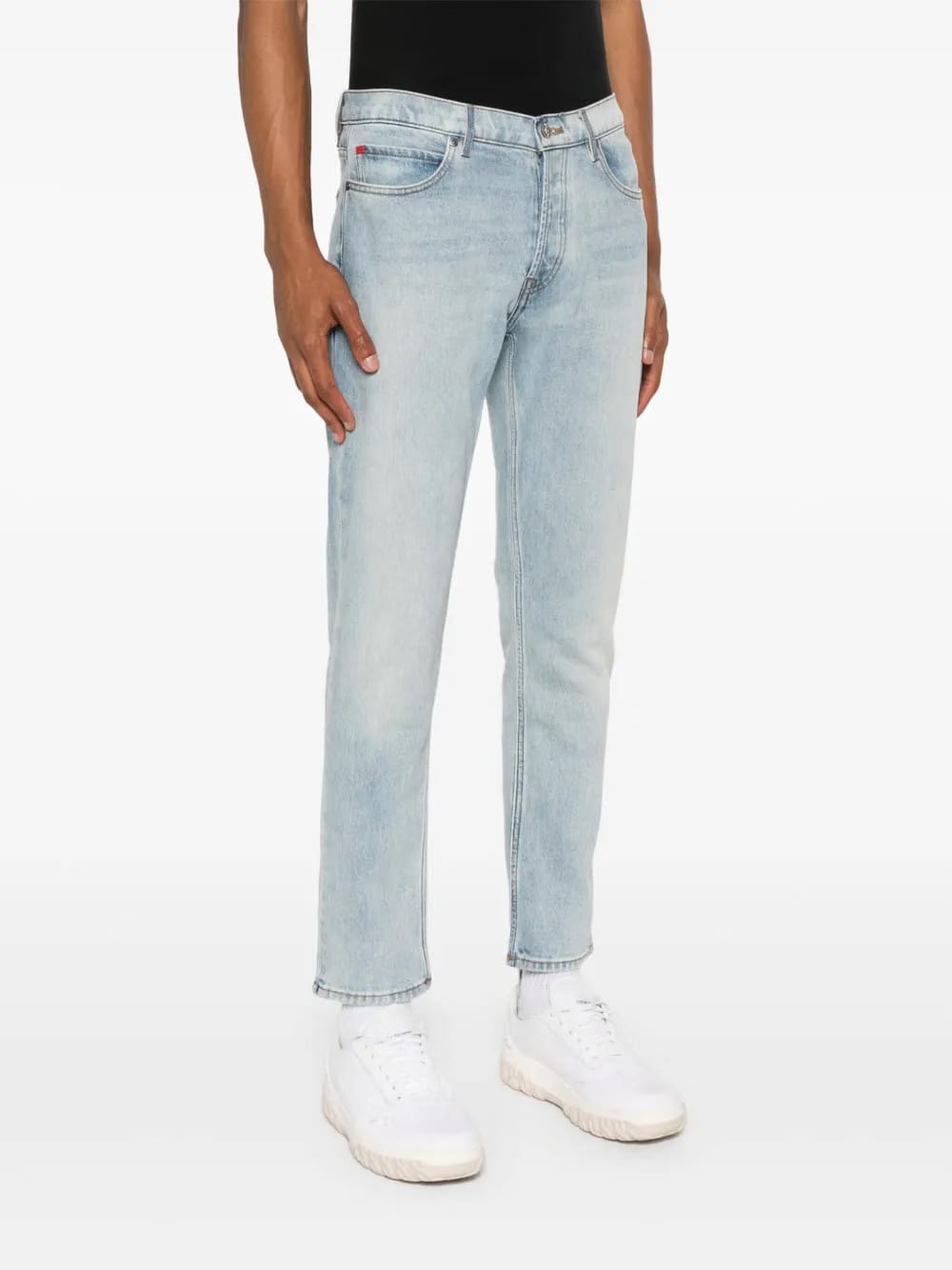 slim-leg cotton-blend jeans