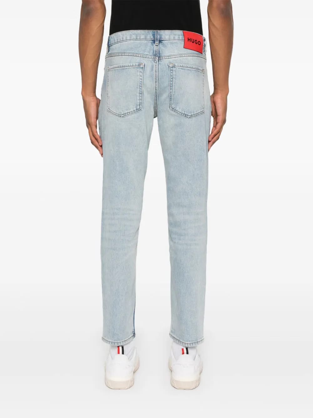 slim-leg cotton-blend jeans