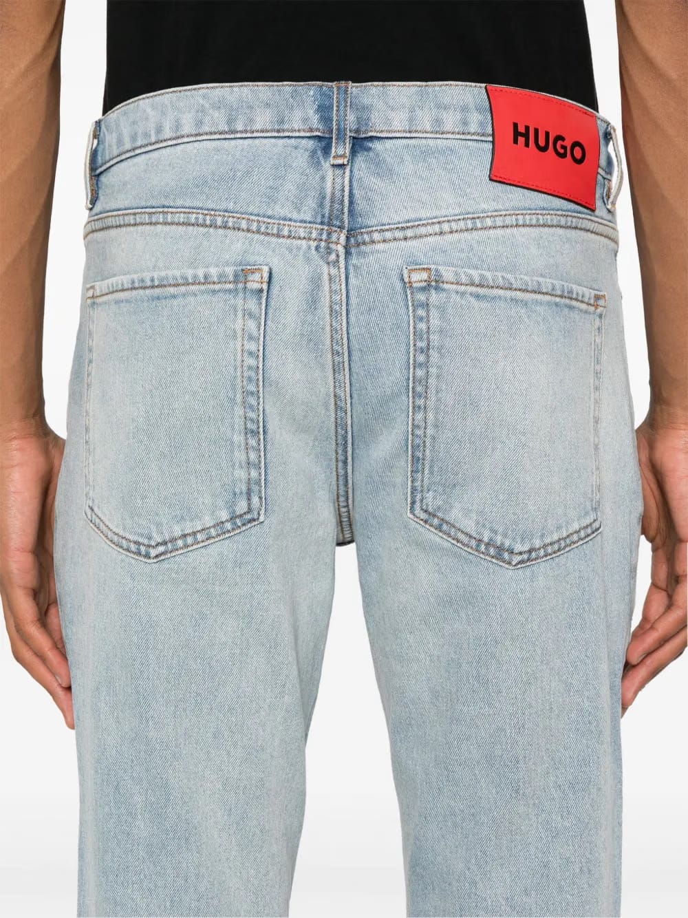 slim-leg cotton-blend jeans